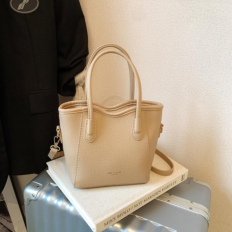 Premium Textur ausländischer Stil tragbare Bucket Bag Damen 2025 neu vielseitige Mode Gemüsekorb einzelne Schulter Messenger Damenhandtasche
