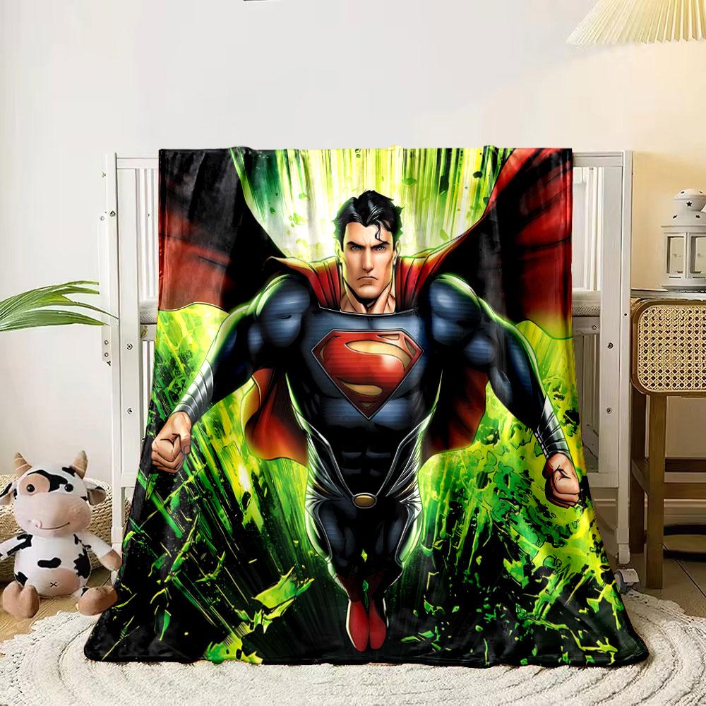 

A flying superhero with a red cape and green glowing background shards. for all seasons blanket lunch break throw gift 80cm x 120cm
