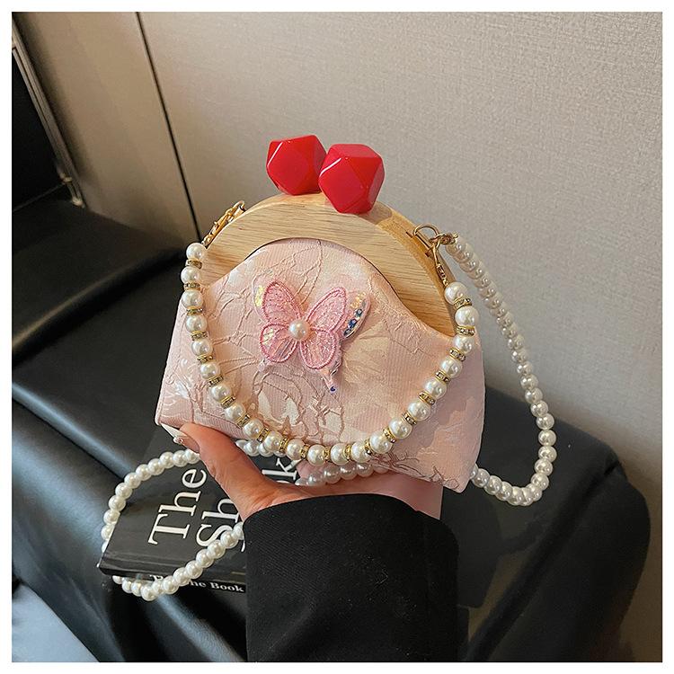 Summer embroidery small bag women's new fashion bamboo joint portable mouth gold bag pearl chain messenger bag