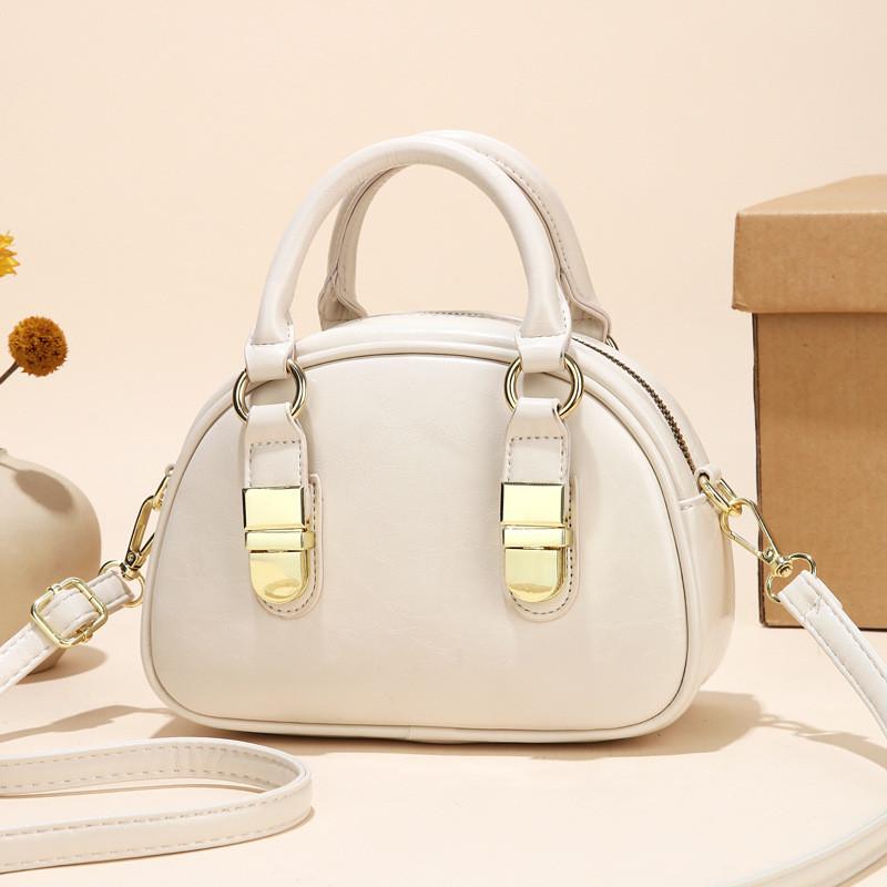 

Elegant Spacious And Shoulder Bag For Women With Unique Shell Shape And Durable Lining Polyester кремовый