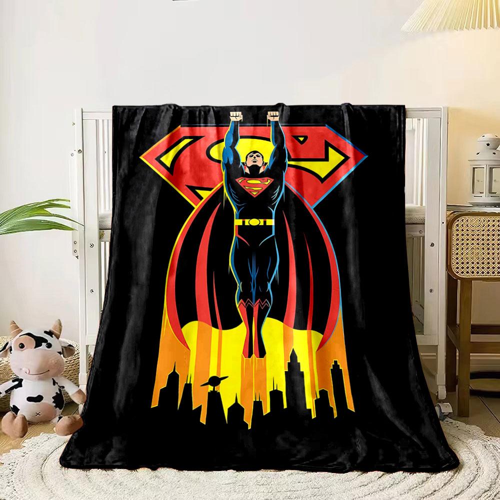 

A superhero figure in flight poses with a bold emblem over a city skyline. for all seasons blanket lunch break throw gift 80cm x 120cm