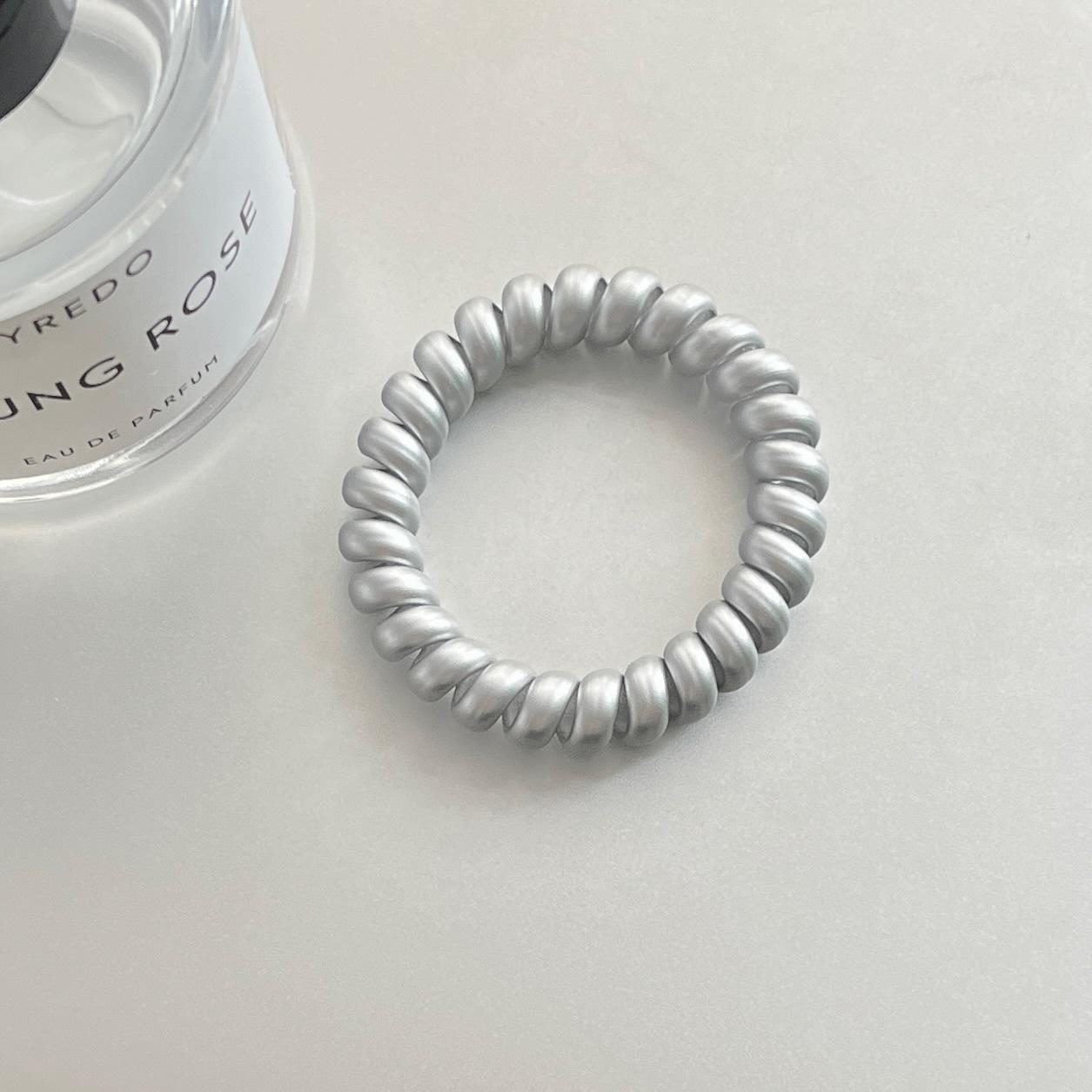 

Серебристая резинка для волос в виде телефонного шнура: Минималистичный, Универсальный, Эластичный и Стильный Корейский Дизайн для Женщин