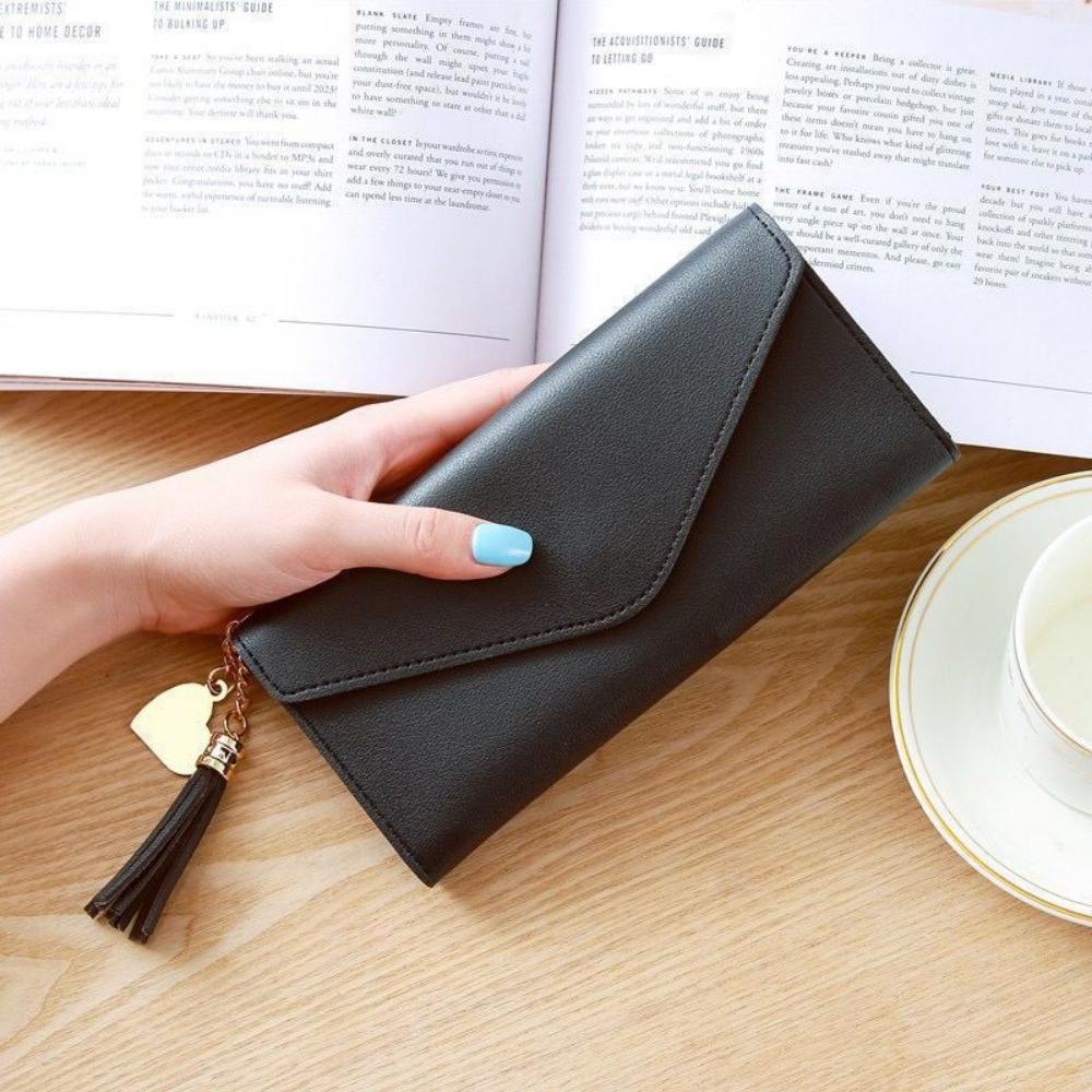 New tassel pendant women s wallet long fashionable coin purse Korean version cute student zipper card bag and coin bag 1630₽