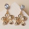 Flower Metallic Gold Earrings With Decorative Stones For Fashion And Celebration