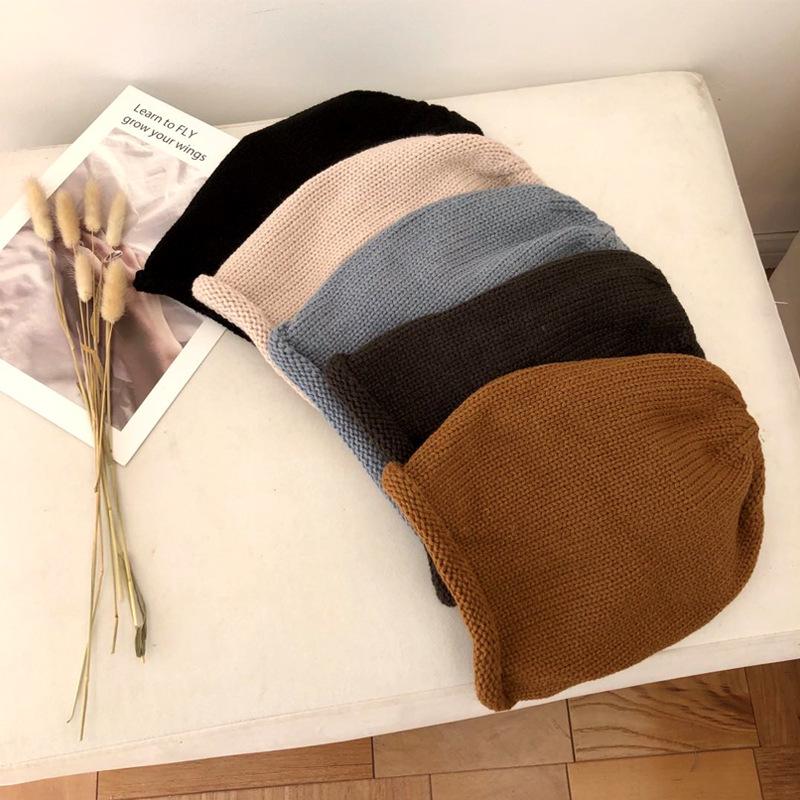 Autumn and winter solid color warm crimped wool hat men's and women's versatile knitted hat fashion street drawstring stacking hat