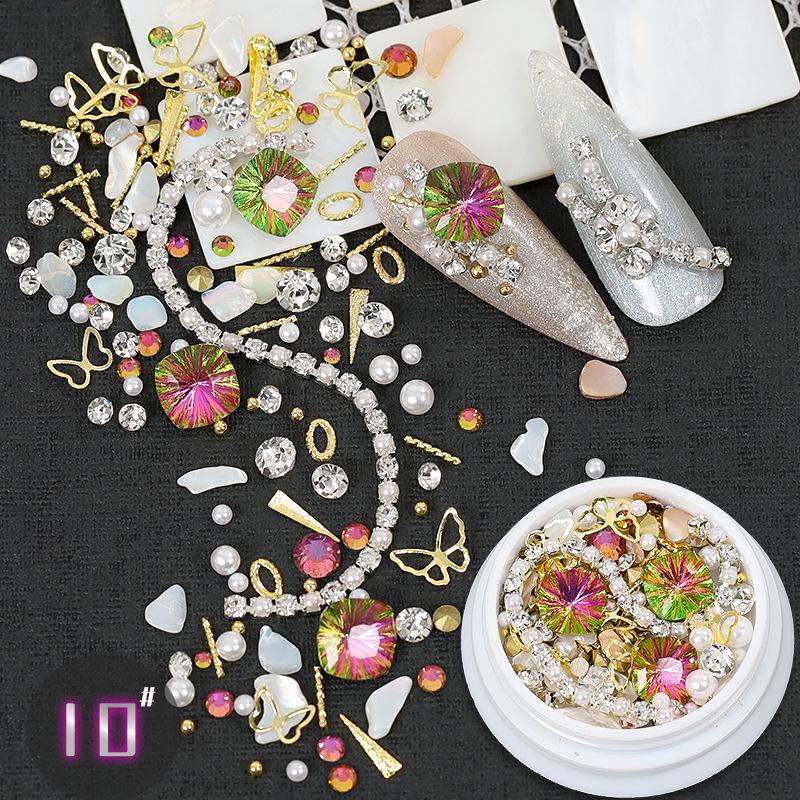 Dolphin Bay Nail Art: Shell Pieces, Rhinestones, Pearls, and Metal Chains Mixed Decorations