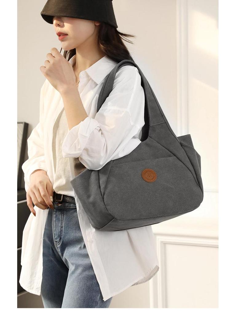2025 Women's One-Shoulder Bag: Trendy, Versatile Canvas Handbag with Large Capacity, Simple Korean Style, Solid Color.