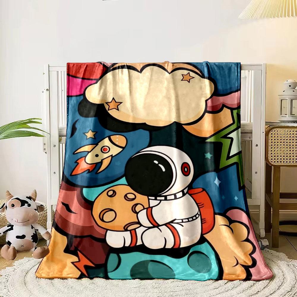 Astronaut on colorful planets with rocket, stars, and playful design. for all seasons blanket lunch break throw gift 80cm x 120cm