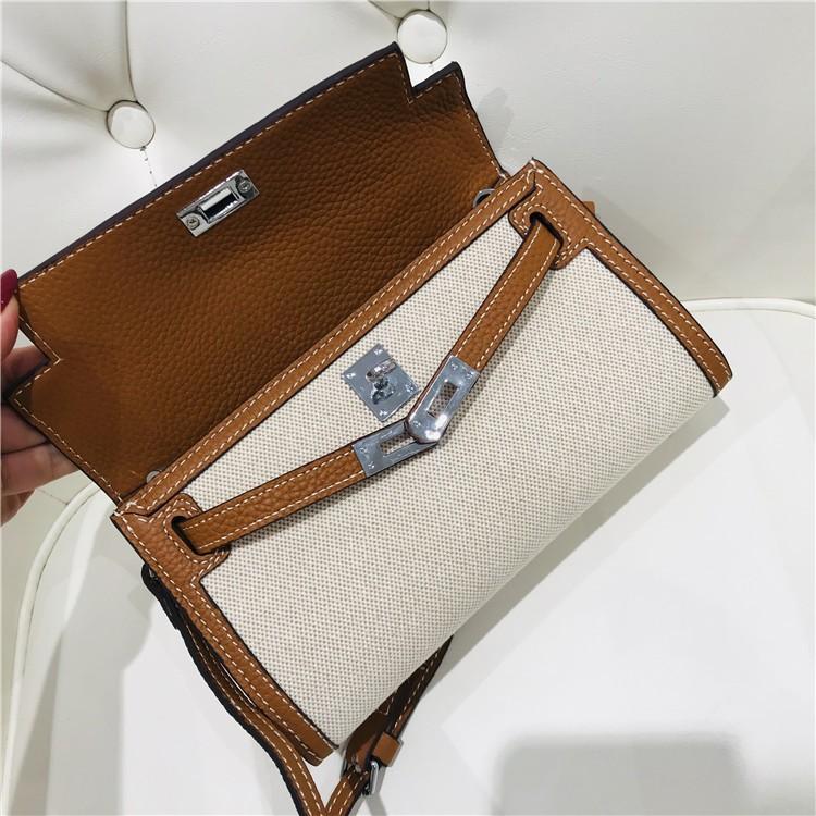 Nowej generacji płócienna torebka kopertówka ze skóry krowiej damska torba na ramię ukośny mała torba torba startowa