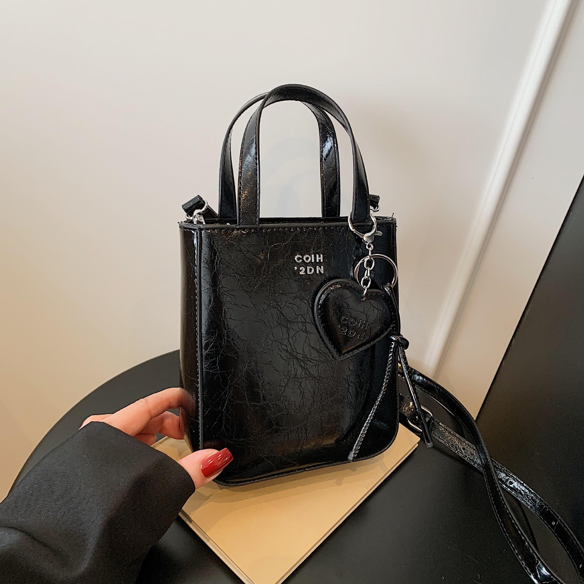

Trendy handbag new insi oil wax leather premium love bag foreign style shoulder messenger bag premium sense versatile чорний