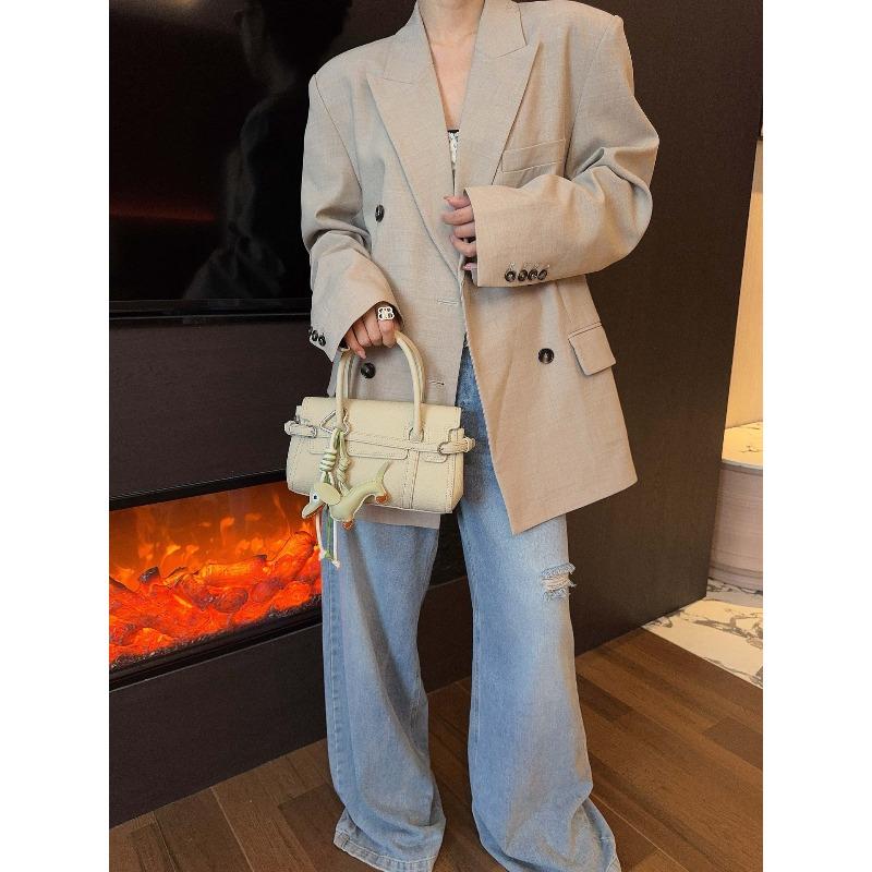 Pillow bag women s new niche sausage baguette bag portable messenger bowling bag