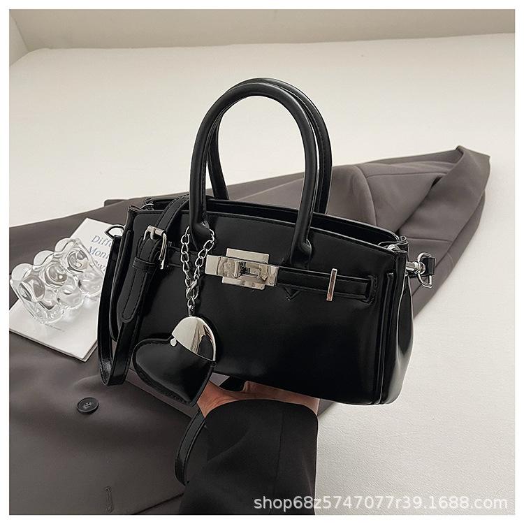 

This year s popular handbag women s 2025 new foreign-style oil wax leather messenger bag niche design shoulder messenger bag чёрный