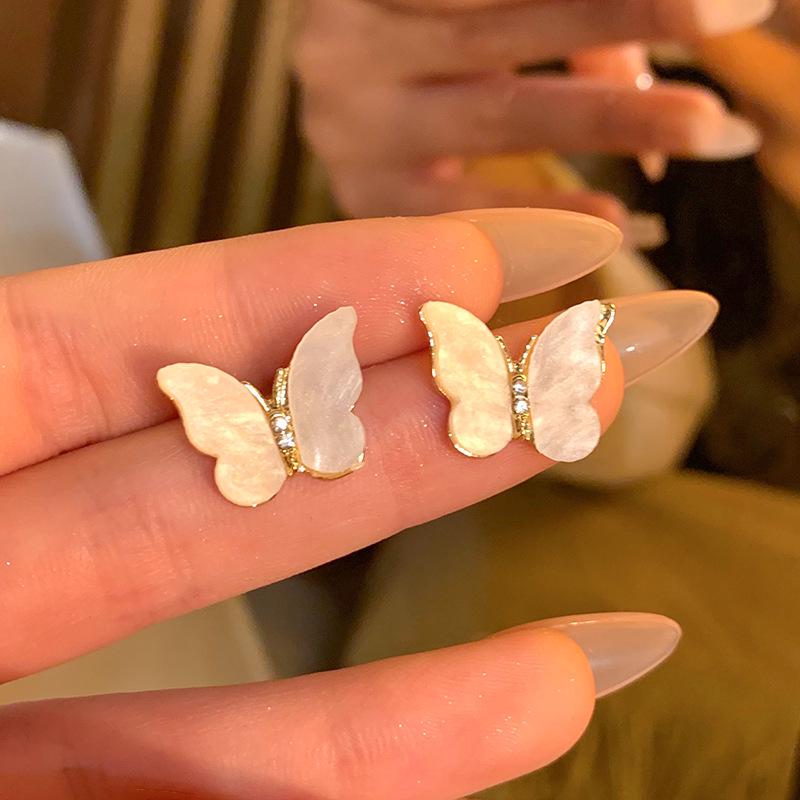 2025 Trendy Korean Micro-Inlaid Zircon Bow Earrings with S925 Silver Needle and Pearl for Women