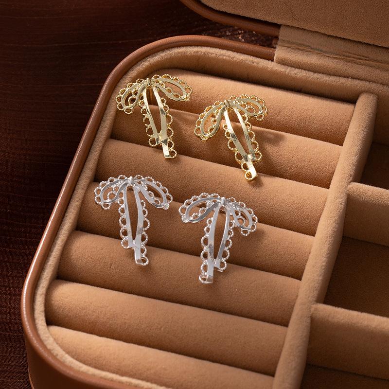 Cold Wind Hollow Bow Stud Earrings Women'S Simple Niche Design Temperament Versatile High-End Sense Ribbon Earrings Earrings