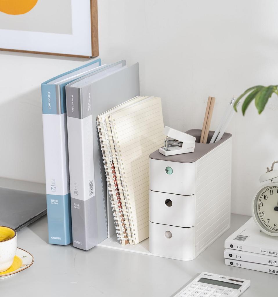This White Desk Organizer Combines Storage and Book Storage. It Has a Book Stand, Drawer, and Pen Holder, Allowing You To Store Everything from