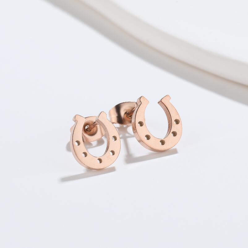 Stylish U-shaped Hollow Stud Earrings with Horseshoe Pendant for Women