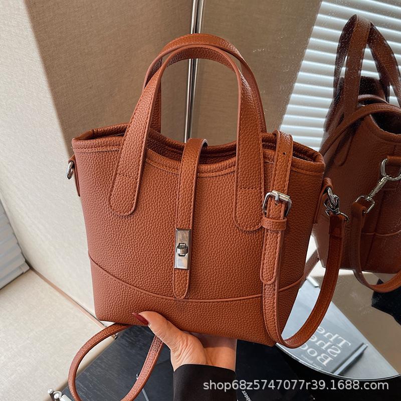 Commuter fashion hand-held small bag women's 2025 new versatile large-capacity one-shoulder crossbody bag simple temperament bucket bag