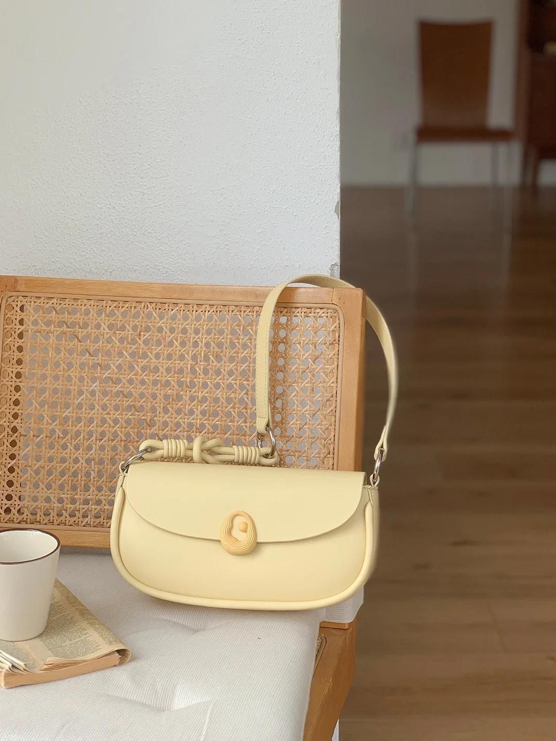 

Сумка подмышечная сумка мода 2024 новый дизайн сумка через плечо ниша простой премиум иностранный стиль портативный плечо жёлтый