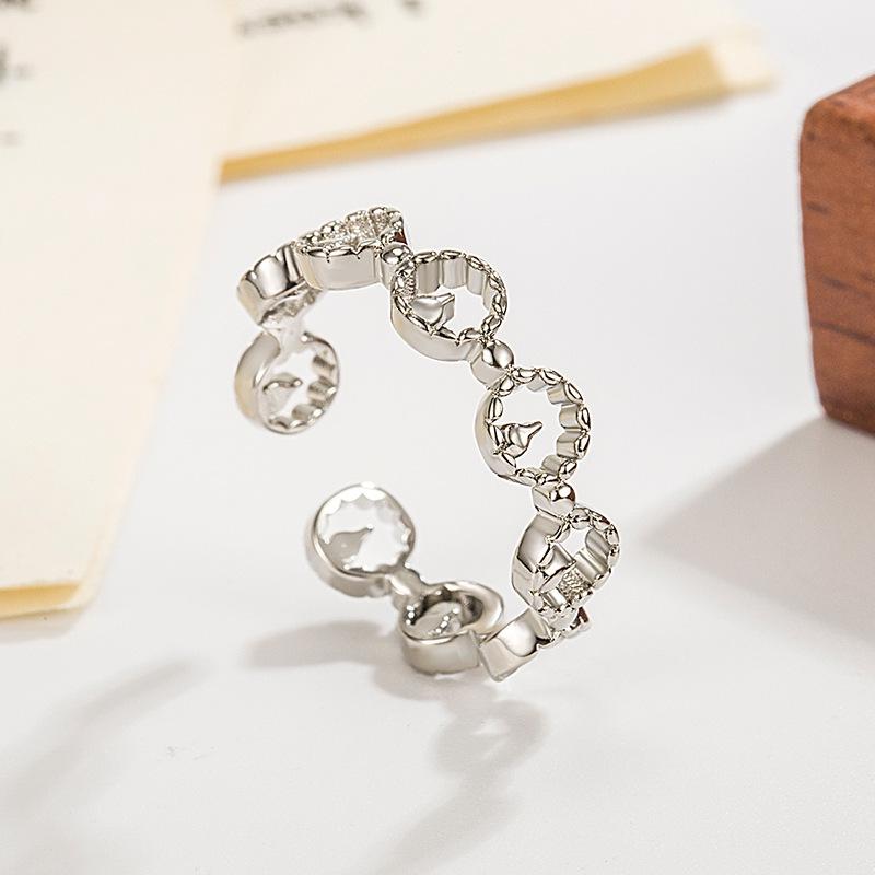 Rizhao Golden Mountain Women's Luxurious Hollow Index Finger Ring - Fashionable, Versatile, Unique Style.