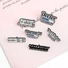 Versatile Elegant And Alloy Letter Brooch Perfect For Fashionable Commuting Gifting And