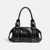 The Niche "chic Girl" Is Carrying A Trendy Crossbody Bag with A Casual Tote Design.