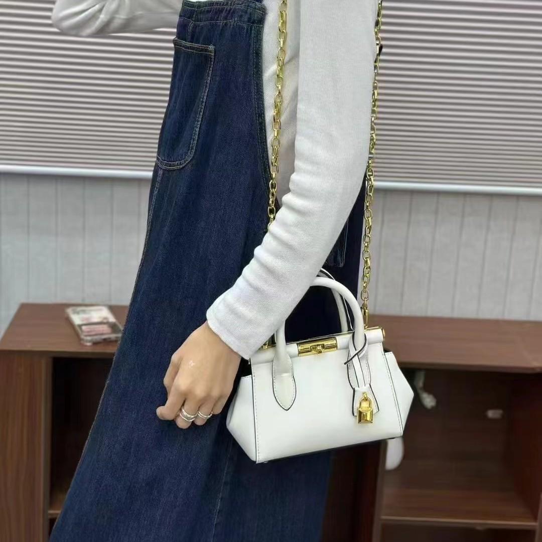 

Rotating Buckle 2026 Women s Bag Light Luxury Texture Hand-held Cowhide Handbag Women s Versatile Crossbody Bag 24*8*15