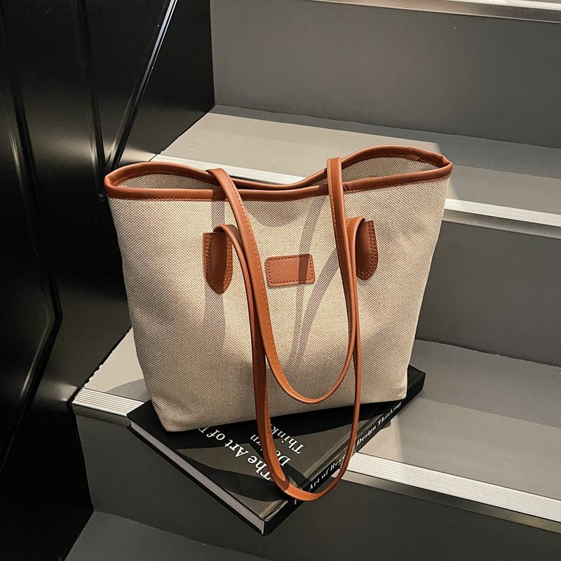 

Простая контрастная расцветка и вместительная сумка-тоут для поездок на работу 2025 новая трендовая высококачественная ретро портативная плечевая тканевая сумка