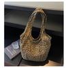 This season, Korean ins style leopard print canvas bag casual large capacity commuter women's shoulder underarm triangle tote bag