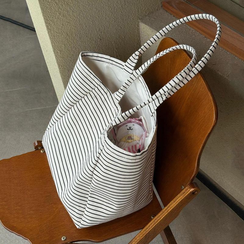 Koreanischer fauler Wind Streifen kontrastierende Farben, kleine frische Canvas-Tasche, große Kapazität für Schule Pendeln, hochwertiger ein Schulter-Tragetasche