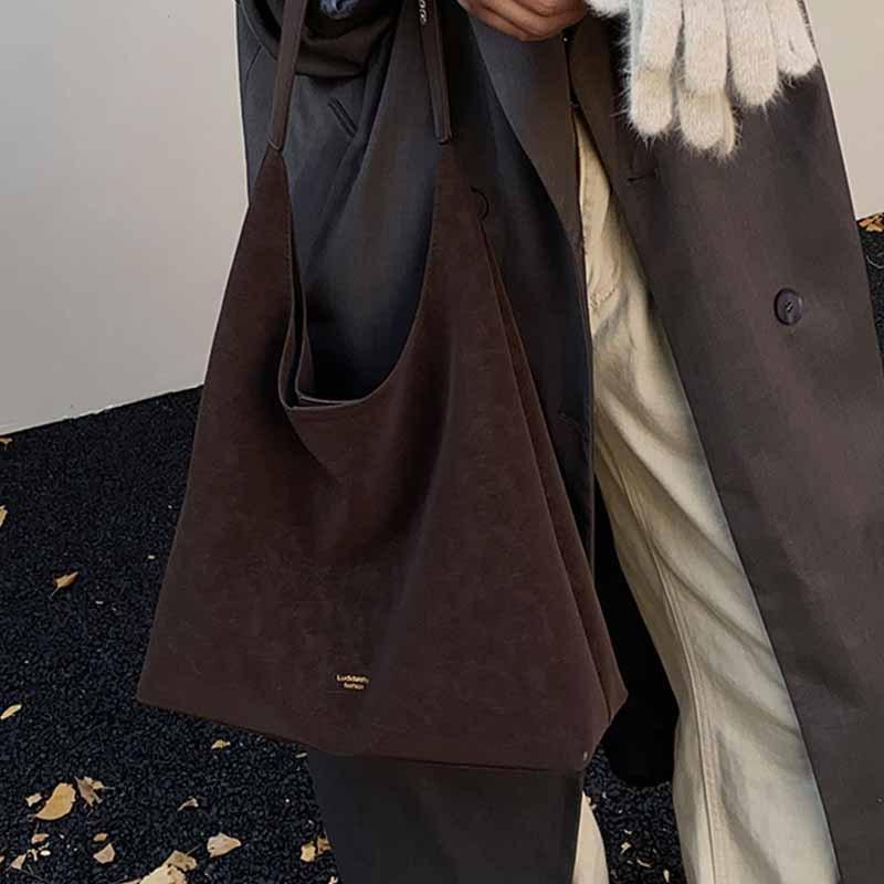 2025 Neue personalisierte Mode Lässige Schulter-Tragetasche Retro Große Kapazität Mode Pendler Schulterbrötchen Schwiegermuttertasche