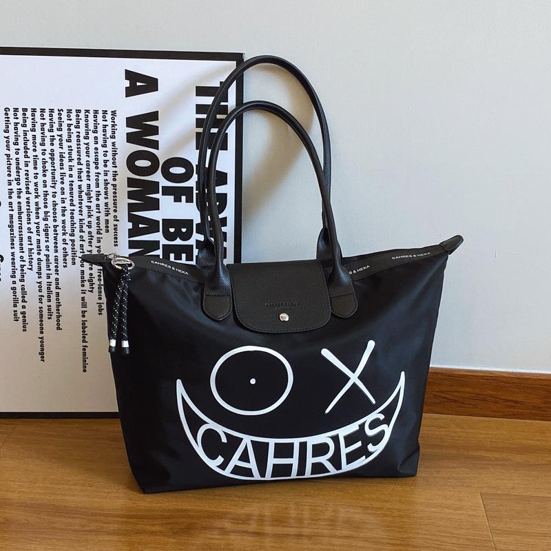 Large capacity bag women's new high-end sense niche portable shoulder bag fashion messenger tote bag tide