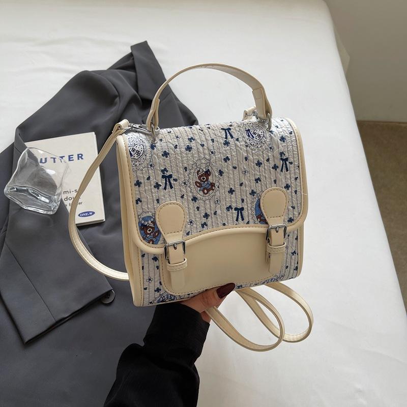 

Korean version of college style cute cartoon bear handbag women 2025 new fashion casual backpack student schoolbag