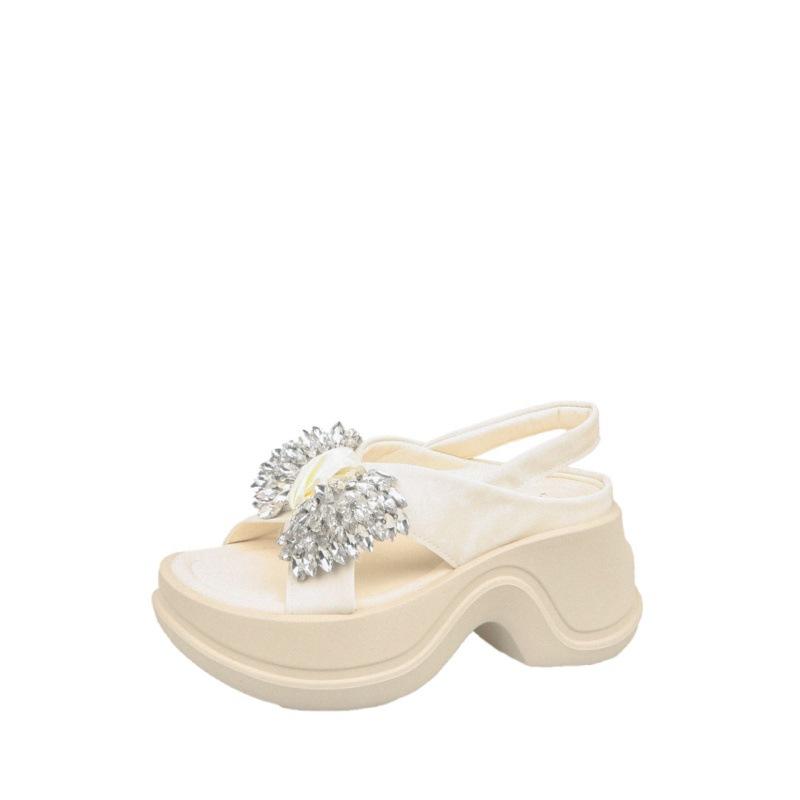

Hong Kong style open-toed rhinestone sandals for women s outer wear in the summer of 2025, the new cross-strapped bow thick sole is cool 35