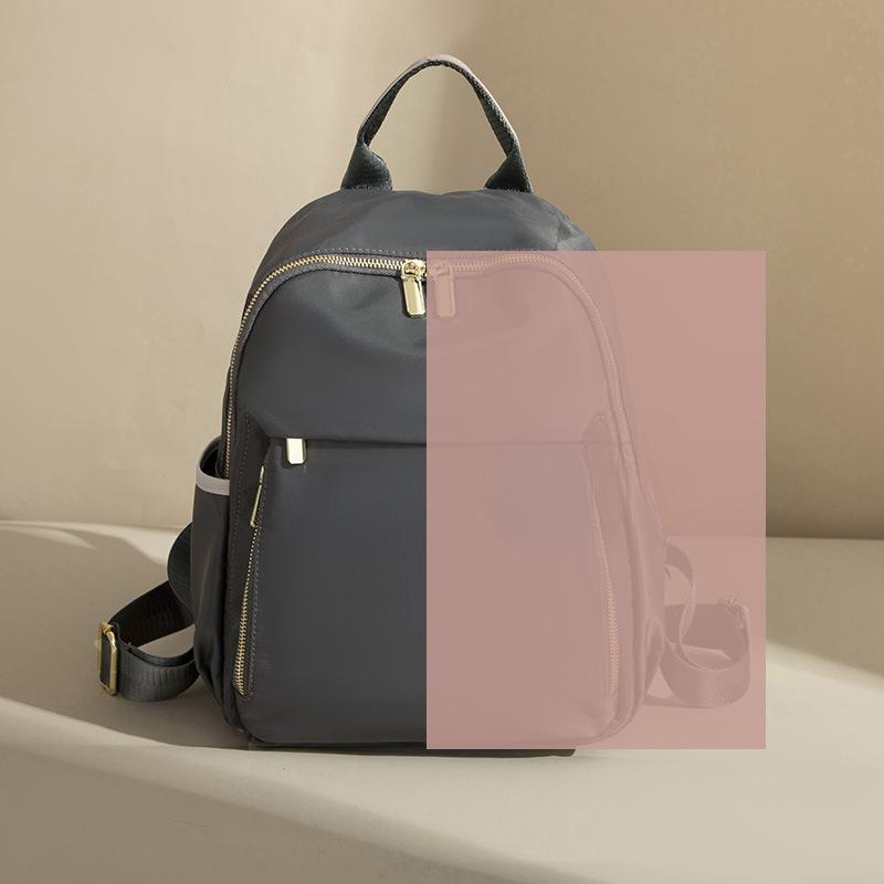 

Новый рюкзак большой вместимости из высококачественной легкой ткани Оксфорд, модный и стильный, водонепроницаемый, для путешествий и школы