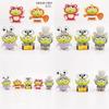 Adorable Three-eyed Alien Figurine In Various Character Costumes Fun Collectible
