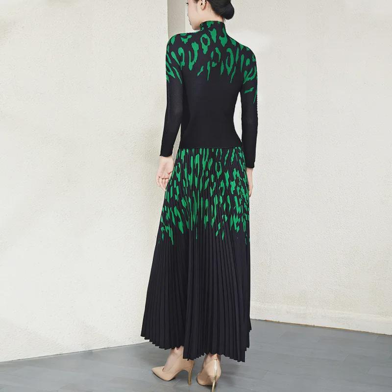 Women's Leopard Print Pleated Two-Piece Set: Long-Sleeve Stretch Top and Skirt.