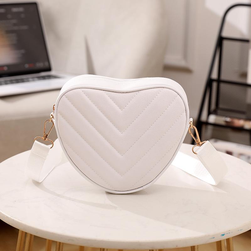Sweet heart-shaped small bag, new fashion embroidered women's bag, shoulder messenger bag, women's mobile phone bag.