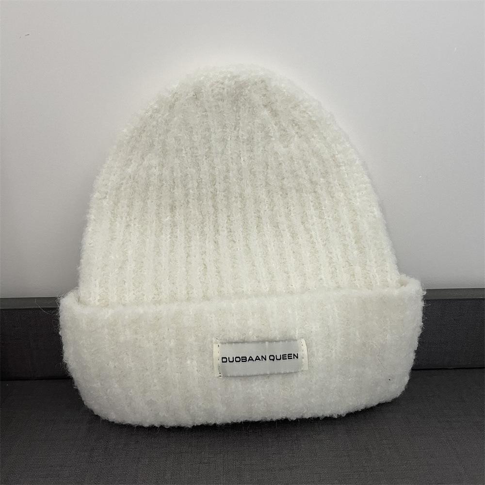 

Вязаная шапка высокой эластичности женская осенне-зимняя универсальная для большого обхвата головы делает лицо маленьким шерстяная шапка однотонная шапка-пуловер теплая шапка Adult average size белый