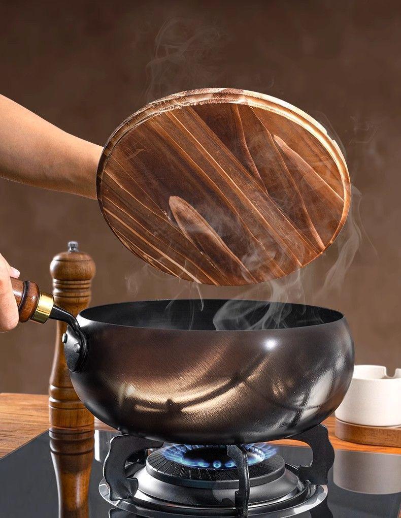 Handcrafted Zhangqiu Iron Belly Wok: Uncoated, Non-stick, Small Iron Frying Pan for Household Use.