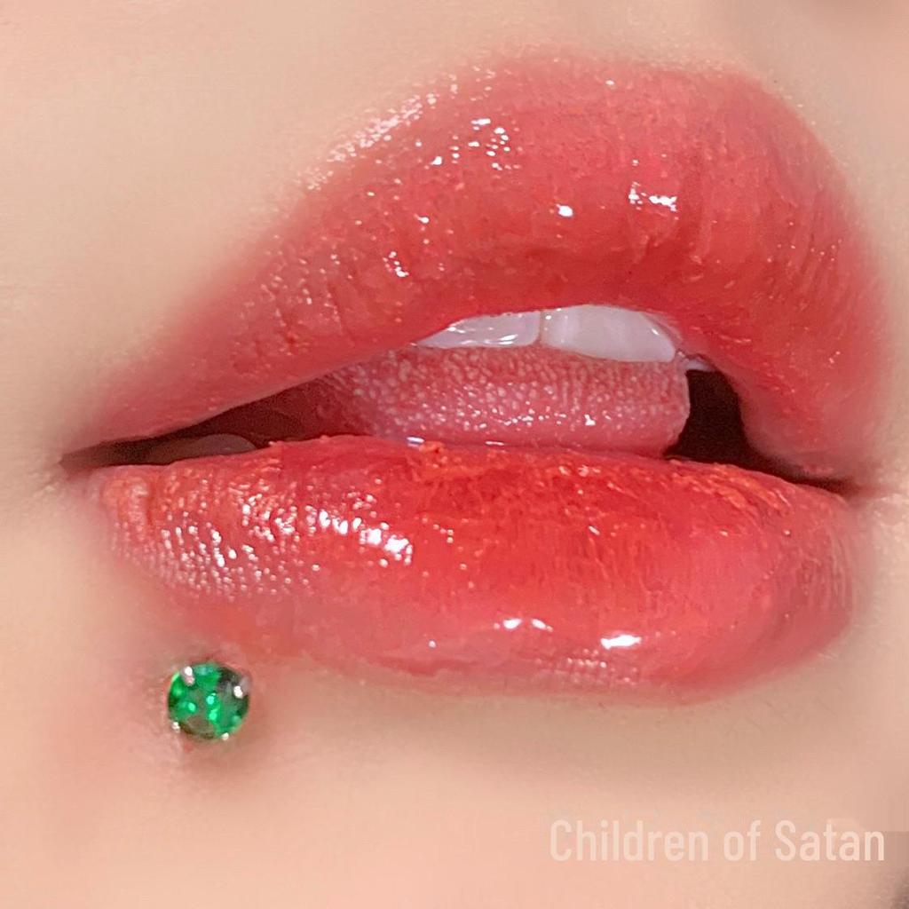 'Satan's Child: Luxury Diamond Lip and Ear Studs for Bold Women'