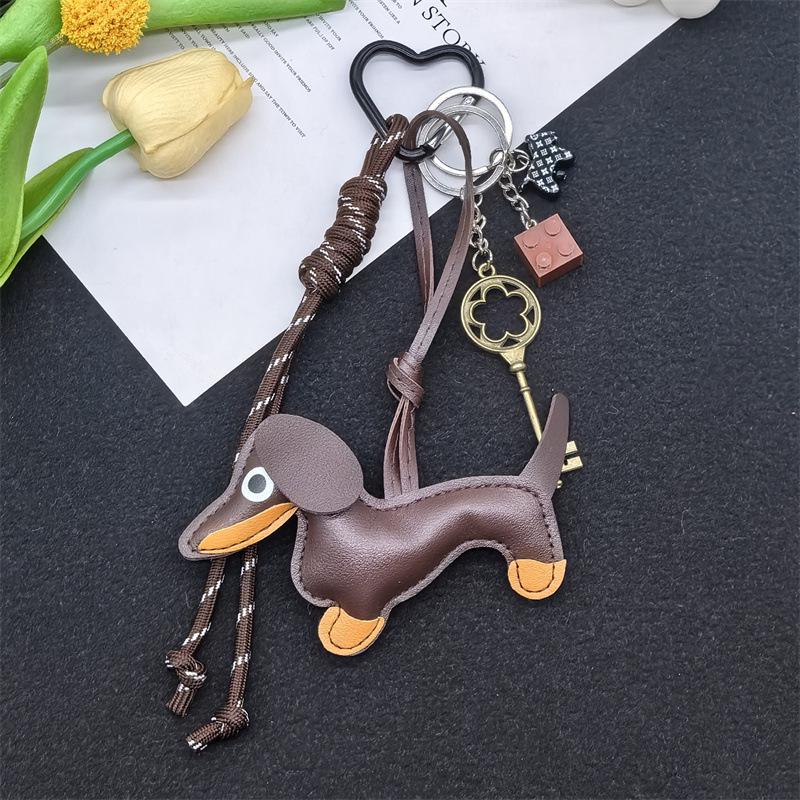 

Leather Cartoon Dachshund Keychain with Woven Rope Pendant