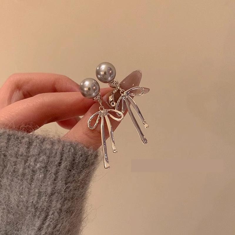 Annual explosion Pearl butterfly earrings women's high-end sense niche 925 silver needle earrings ear jewelry wholesale