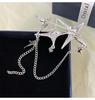 Korean Metallic Star Chain Brooch with Tassel - Niche Fashion Accessory