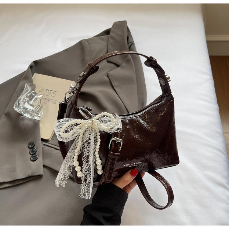 

Премиальная сумка подмышку женская 2025 лето новый тренд зарубежная наплечная сумка нишевая плиссированная текстура сумка-мессенджер темно-коричневого