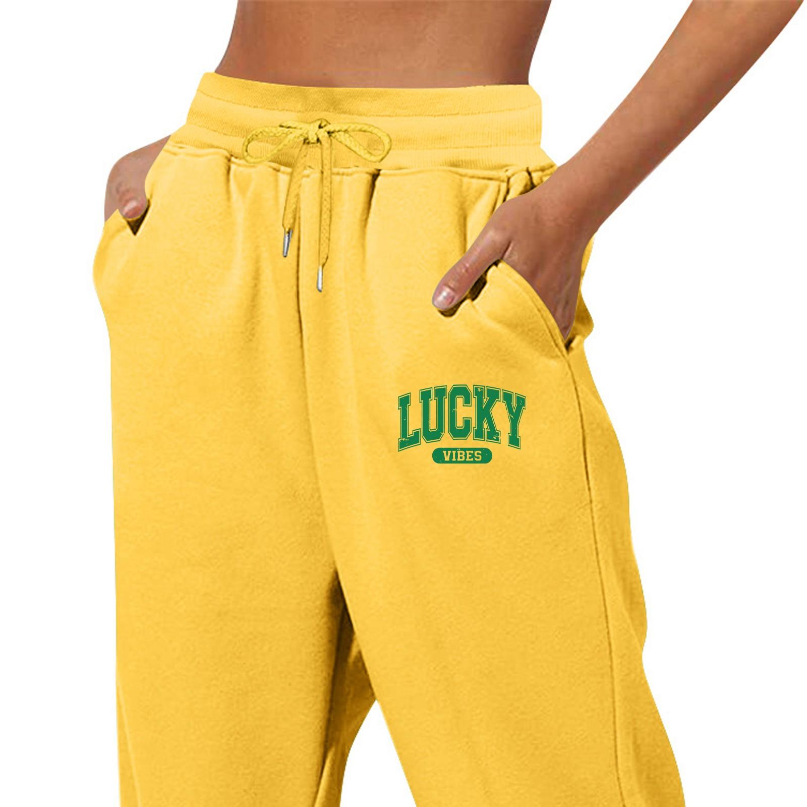 

Весенние и однотонные принтованные модные женские повседневные брюки с карманами и шнурком L жёлтый