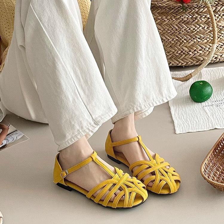 French summer new hollowed-out one-word strap Roman shoes flat-bottomed bag head sandals women's Mori women's niche design hollow