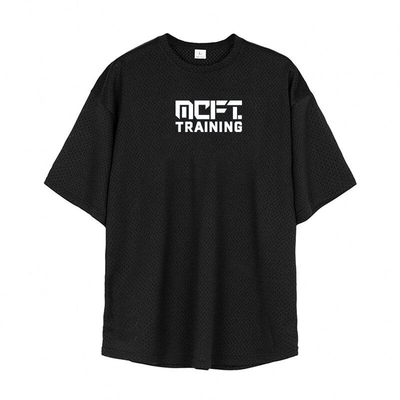 Muscleguys Auf Lager Jugendsport Herren-Fitnesskleidung Kurzarm-T-Shirts Dünne atmungsaktive Sommer-Fitness-Mesh-Tops