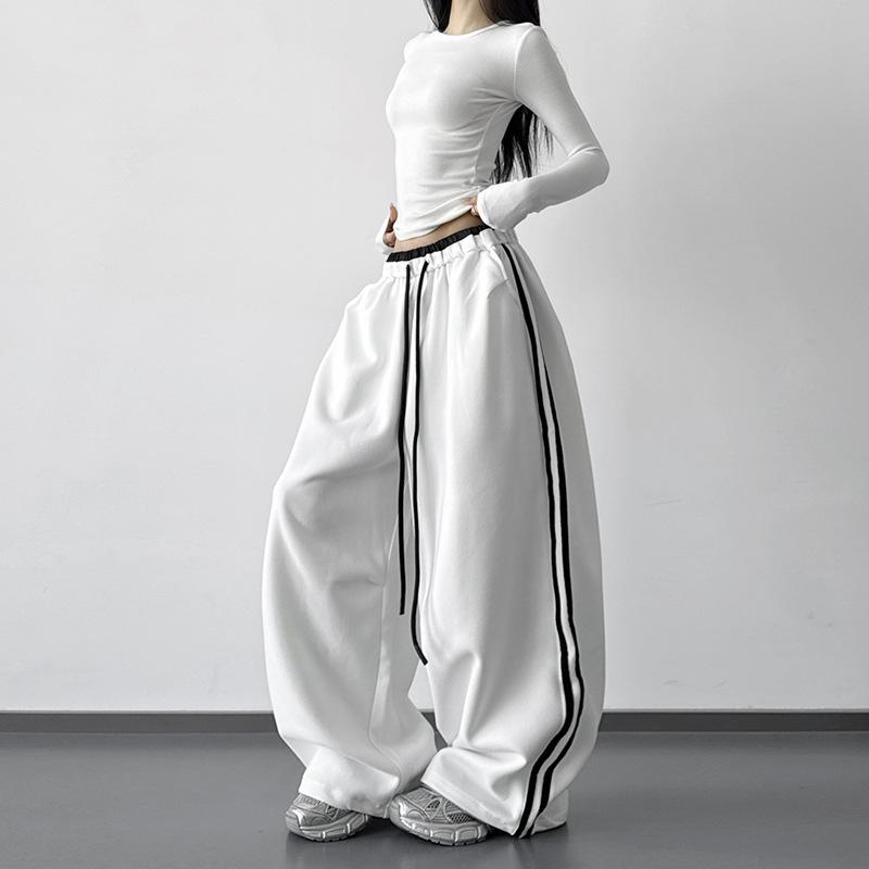 

2025 Women s Black Street Style Wide-Leg Lace Pants with New Color Block Design for Autumn White Extended