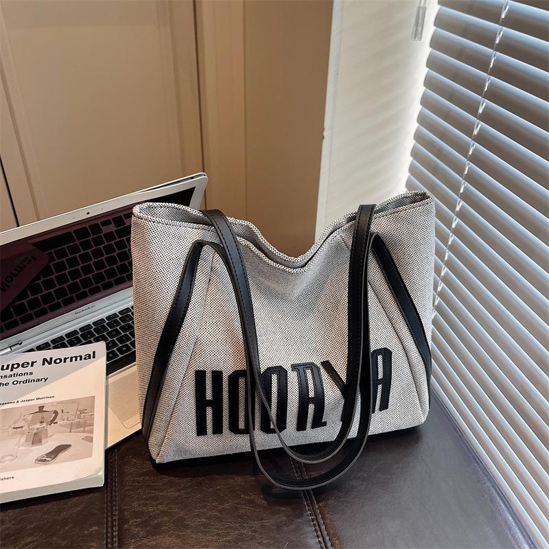 

Холщовая сумка большой вместимости женская 2025 новая модная повседневная сумка через плечо с высокой текстурой студенческая для учебы и работы сумка-тоут чёрный