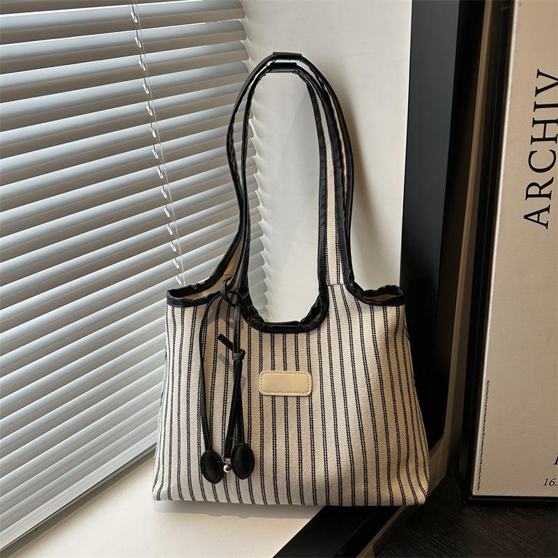 2025 New Niche Shoulder Bag Striped Simple Tote Bag Simple Versatile Portable Color Matching Armpit Bag